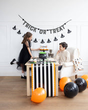 Load image into Gallery viewer, Orange and Black Striped Paper Table Runner